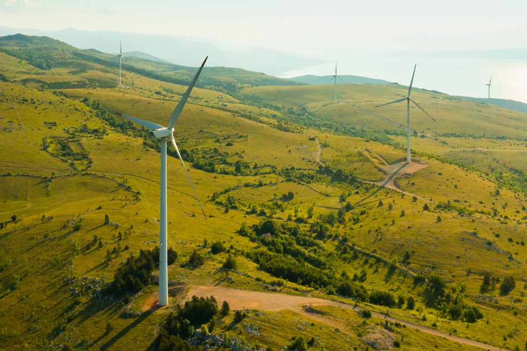 windmills operate producing green energy on hill s 2022 02 16 18 51 09 utc